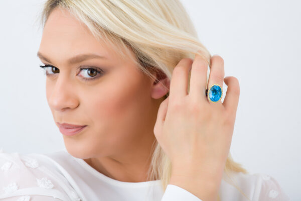 Titanium Ring with Blue Topaz oval with Diamond halo