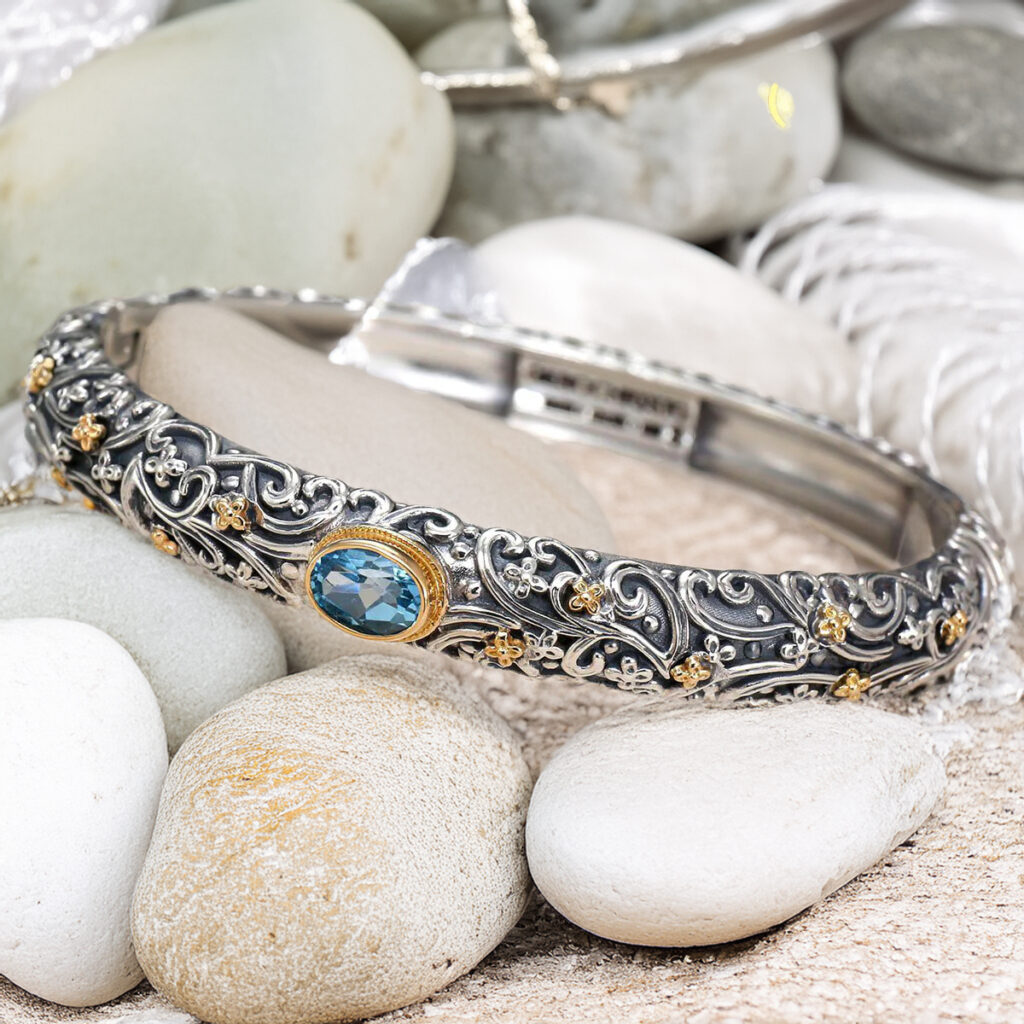 Oval bracelet in 18K Gold and Silver 6442 blue topaz